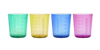 Four colourful plastic measuring cups