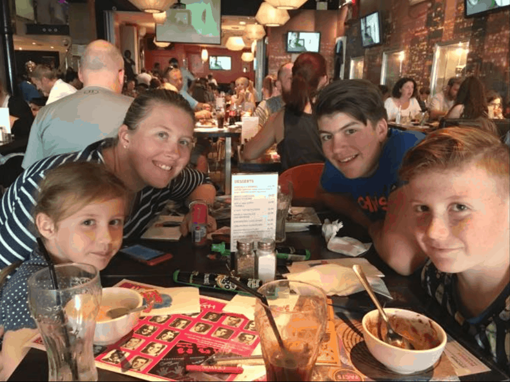 Family dining in a busy restaurant